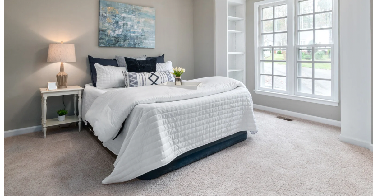 large bedroom with fresh, clean white carpets